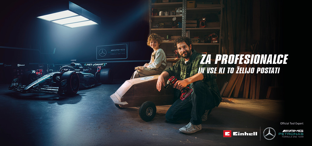 Oče in otrok v delavnici z doma narejeno avtomobilom na vozičku iz mila. V ozadju sta dirkalnik Mercedes-AMG PETRONAS Formula One in orodje Einhell. Na desni strani piše: "Za profesionalce in vse ki to želijo postati."