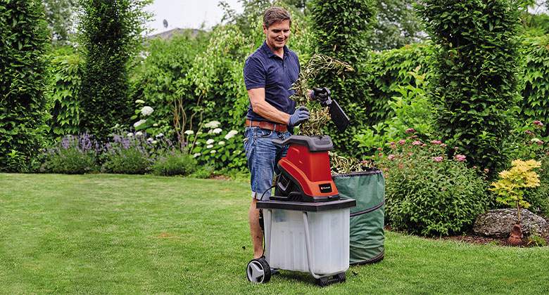 man working with shredder