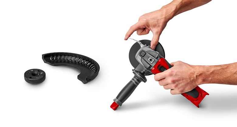 Close-up of an angle grinder with quick-adjust disc guard, slide-on cutting guard, and quick-fix nut.